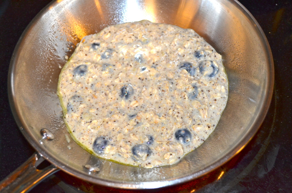 A huge pancake with oats, half a mashed banana, egg whites, protein powder, blue berries, chia seeds, almond milk, little greek yogurt