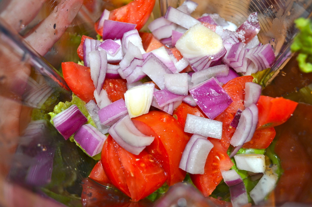 I suggest layering the ingredients like this from bottom to top: peas, avocado, tomatoes, onion, lime juice, salt 