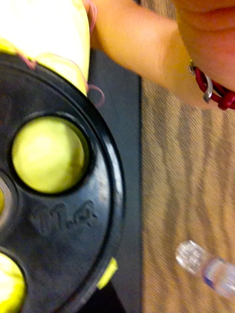 Pic fail, but this is the kind of weight I place on my abs. Flat 25 lb plate