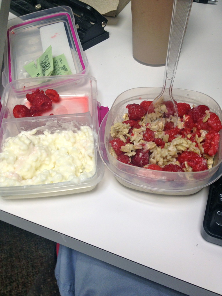 Yummy oatmeal, cottage cheese with a pinch of stevia, raspberries, and half a protein shake! Other half saved for later (I put 2 servings in one to save containers)