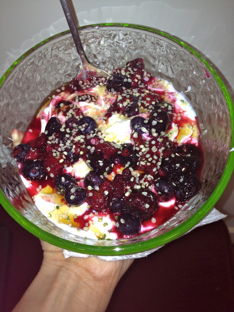 This is nonfat plain greek yogurt, mixed berries (they were frozen), a drizzle of agave nectar and some hemp seeds!