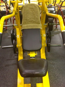 Seated bench press. Using the "boy" machines now!